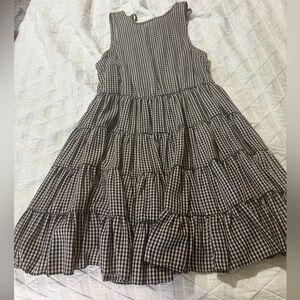 Women’s black and white gingham dress.